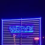 Wave on Lake Conroe sign