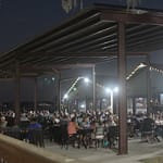 Conroe Lake House night time outdoor dining