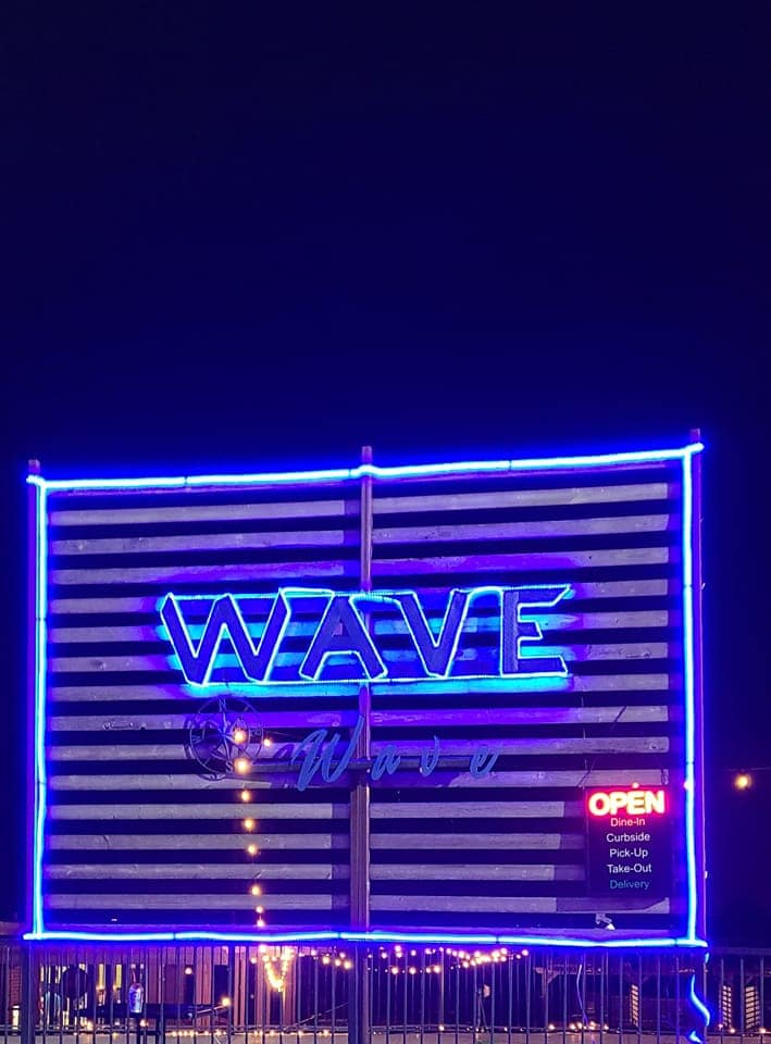Wave on Lake Conroe sign