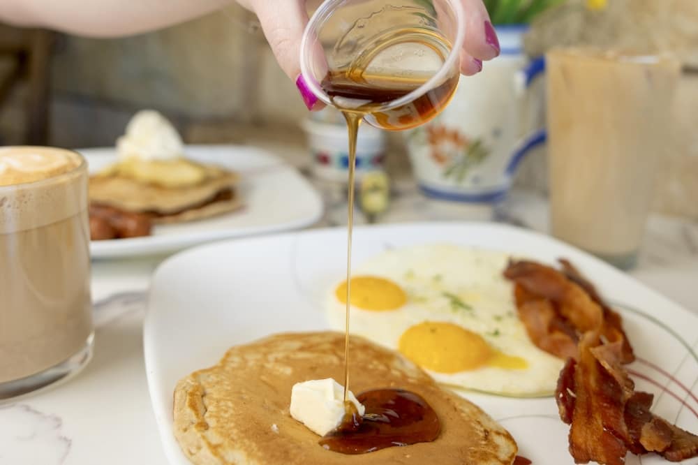 Crepes of Brittany serves traditional breakfast options such as the pancake breakfast served with two eggs and a choice of meat. (CourtesyUltra Branded/Crepes of Brittany)