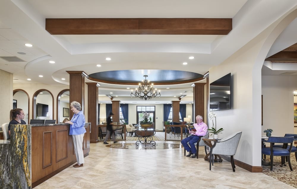 Senior living residents sitting in cafe