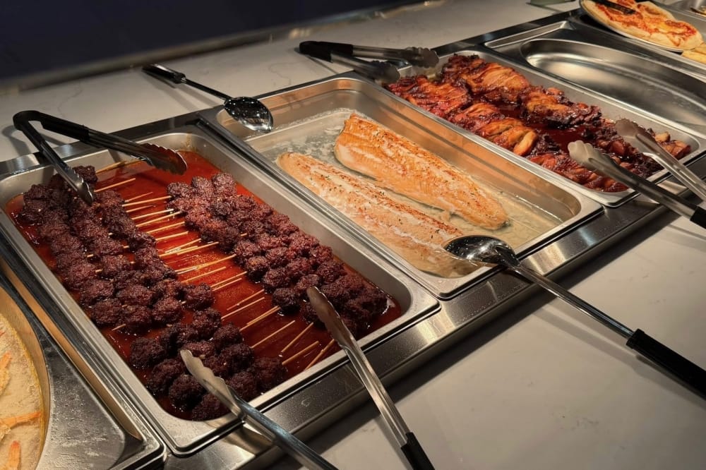Takumi Hibachi Sushi & Seafood Buffet offers a variety of Asian cuisine served buffet style, including salmon, crab legs, sushi, hibachi, beef dishes, chicken dishes and an assortment of sides and appetizers. (Courtesy Takumi Hibachi Sushi & Seafood Buffet)