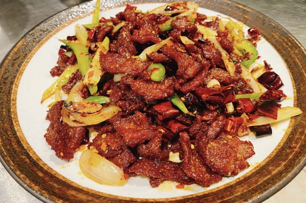 Sichuan beef is one of the dishes that Cooking Girl Chinese Cuisine offers. (Courtesy Cooking Girl Chinese Cuisine)